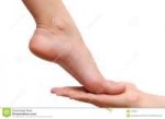 man-s-hand-woman-s-feet-7296621.jpg