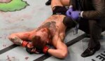 31E9B9C900000578-3478699-McGregorlaysonthegrounddejectedaft[...].jpg