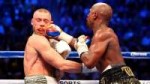 mayweather-r-verpasst-mcgregor-einen-rechten-haken-der-boxe[...].jpg