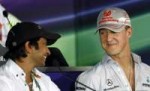 1319804131narain-karthikeyan-michael-schumacher.jpg