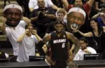 455384-san-antonio-spurs-fans-taunt-miami-heats-lebron-jame[...].jpg