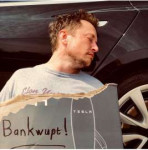 Elon drunk along side his tesla.jpg