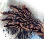 Brilliant-Skeleton-Tattoo-Design-For-Men-Finger.jpg