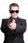 8261555-businessman-man-with-gun.jpg