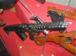 1332995068rifle01.jpg