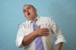 stock-photo-businessman-with-heart-attack-670597723.jpg