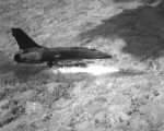 1280px-F-100DfiringrocketsVietnam1967.JPEG