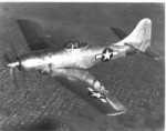 XF8B-1isinflightoveracitymaybeSeattleWA.jpg