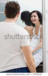 woman-laughing-guy-bathroom-450w-2793225.jpg