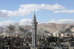 Smoke rises from the besieged Eastern Ghouta in Damascus, S[...].jpg